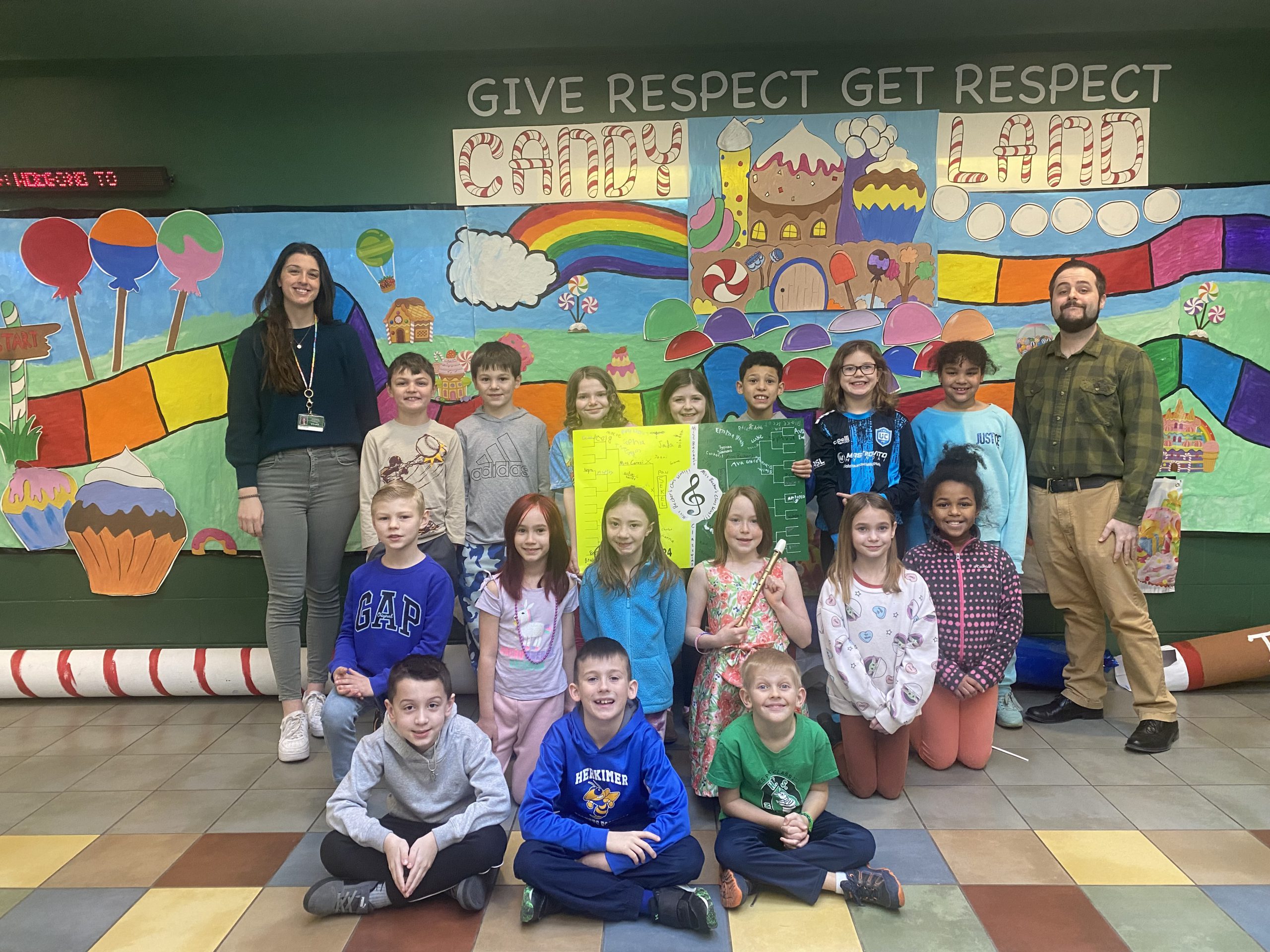 Jenna Becker's third grade class and music teacher William Pegg