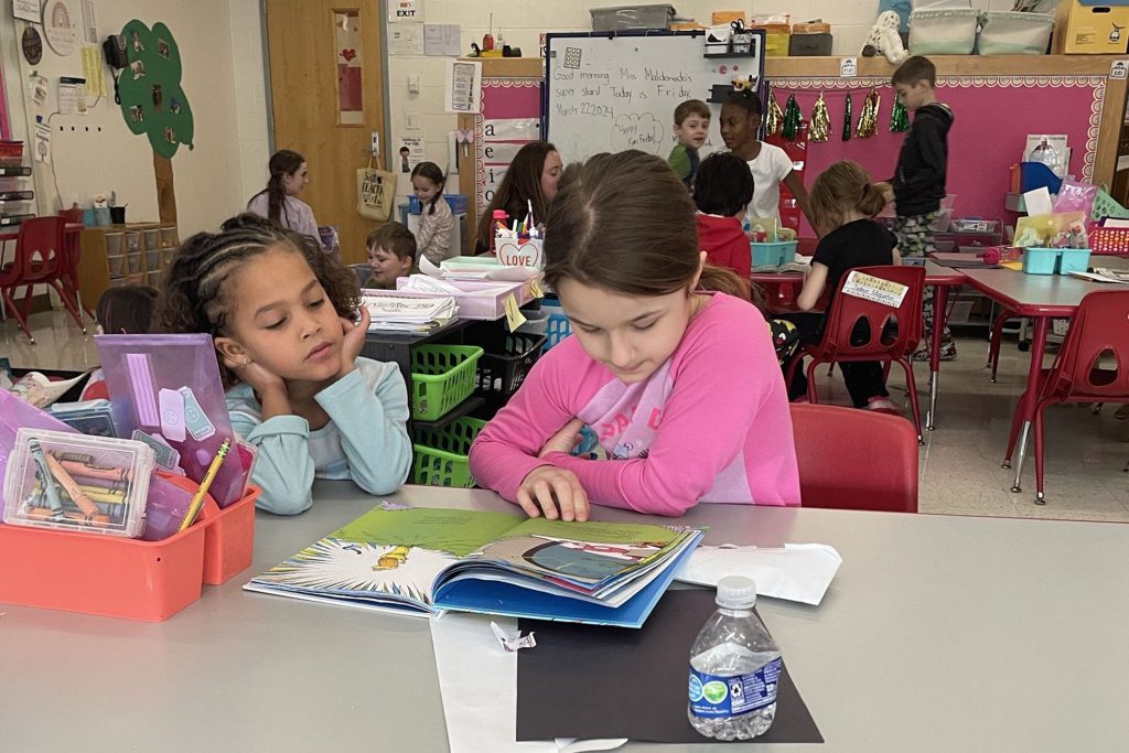 image of students working together in the classroom