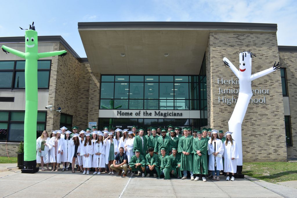 Seniors stand in front of Herkimer Junior-Senior High School