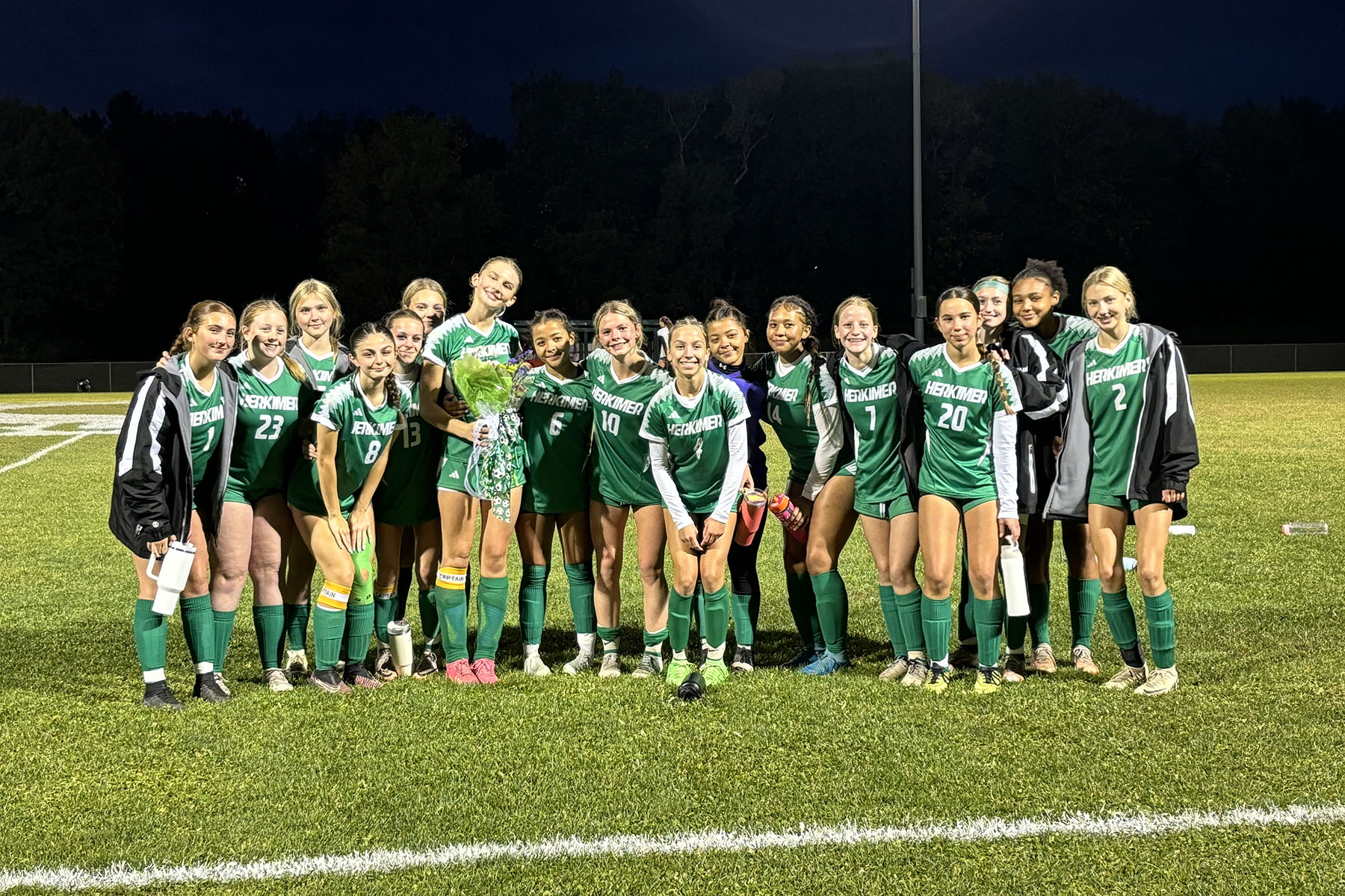 Soccer seniors posing together