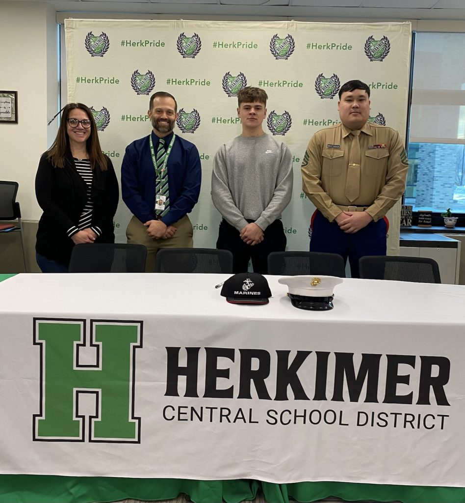 Carolyn Saugh, Zach Abbe, Student Jack Kozma and Staff Sgt. Nakatsukasa 