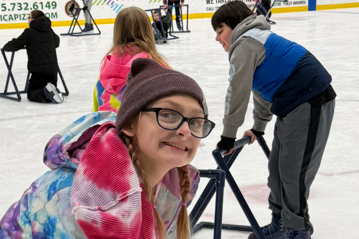 Students on the ice at Nexus Center