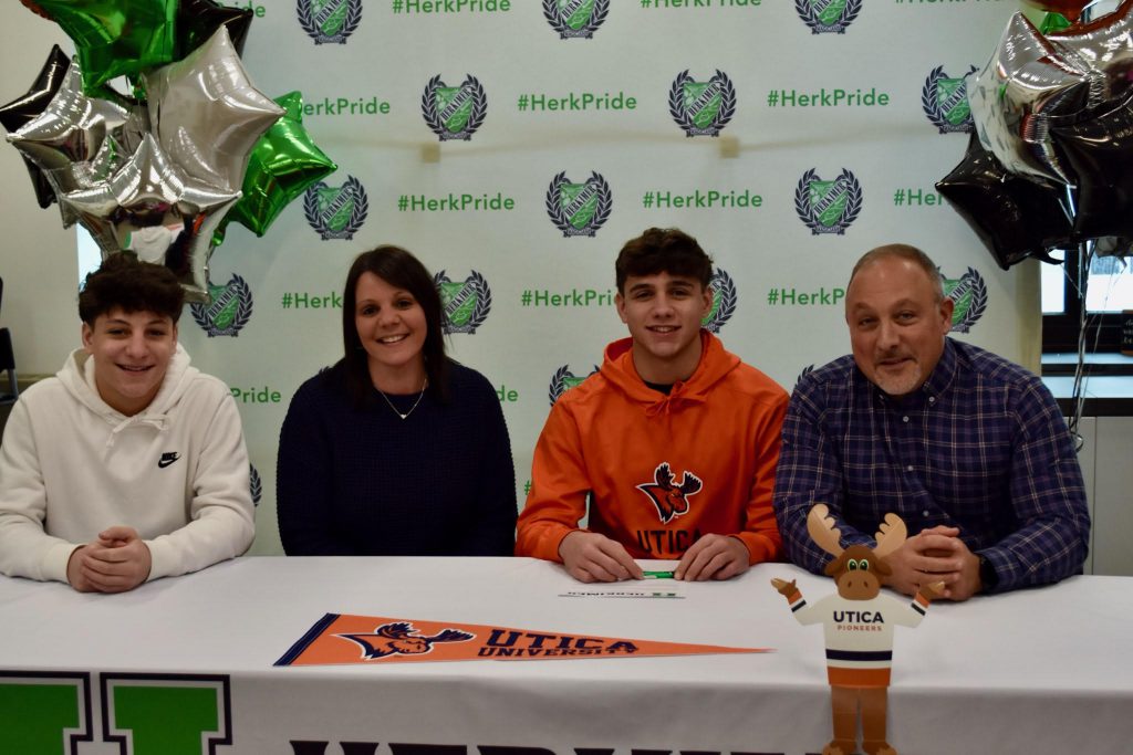 Zachary Petucci with family at commitment letter signing